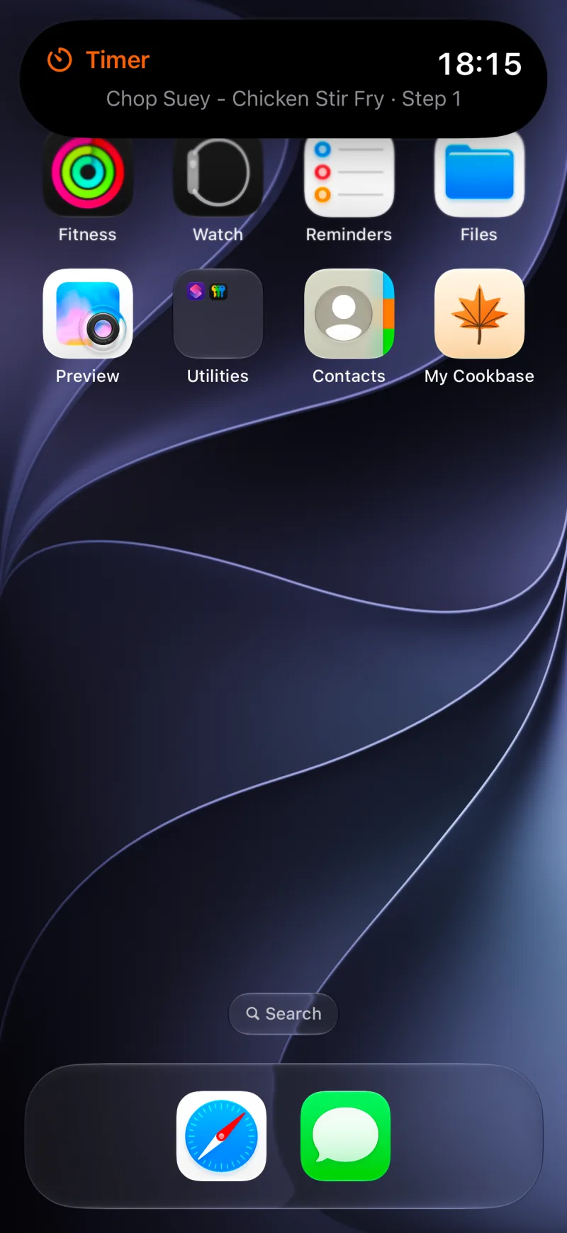 A step timer counting down in the expanded Dynamic Island while the iPhone shows its home screen.